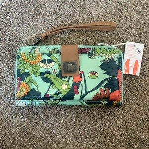 Sea foam green wallet with flower art designed by Joshua Davis